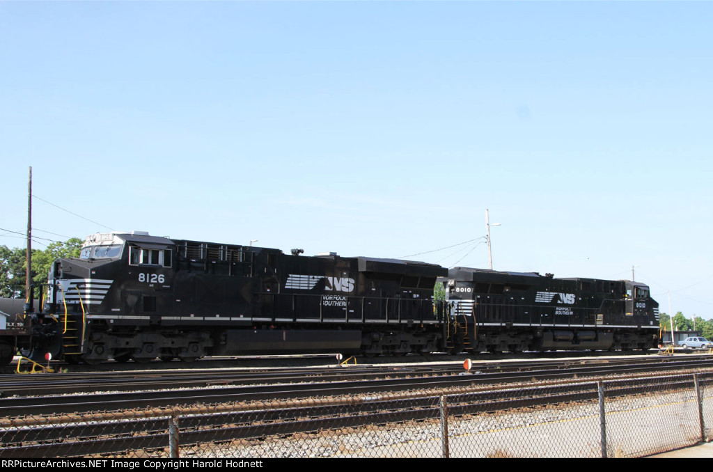 NS 8010 & 8126 lead train 218 thru the yard